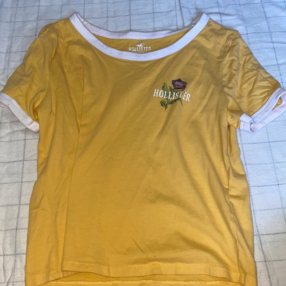 Yellow Hollister Tee shirt.